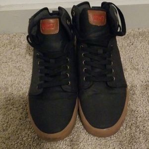 Black and tan cloth sneakers